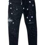 Calça Amiri preta com respingos de tinta brancos