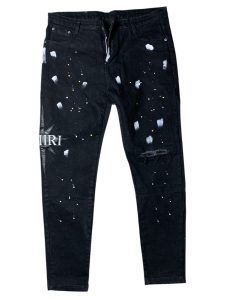 Calça Amiri preta com respingos de tinta brancos